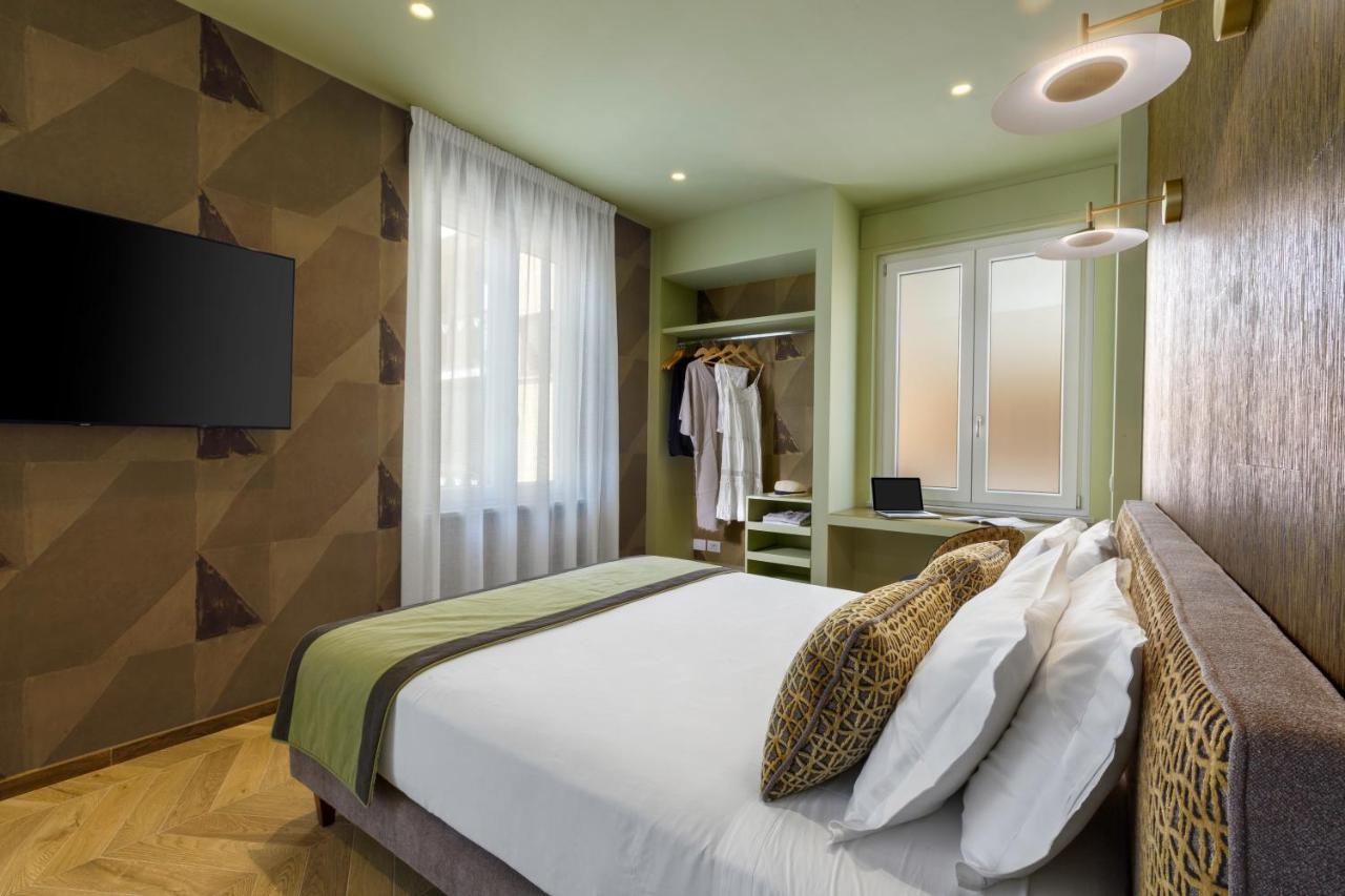 Camera Quadrupla Superior